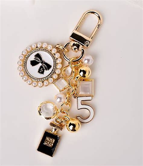 chanel key ring sale|Chanel fluffy keychain.